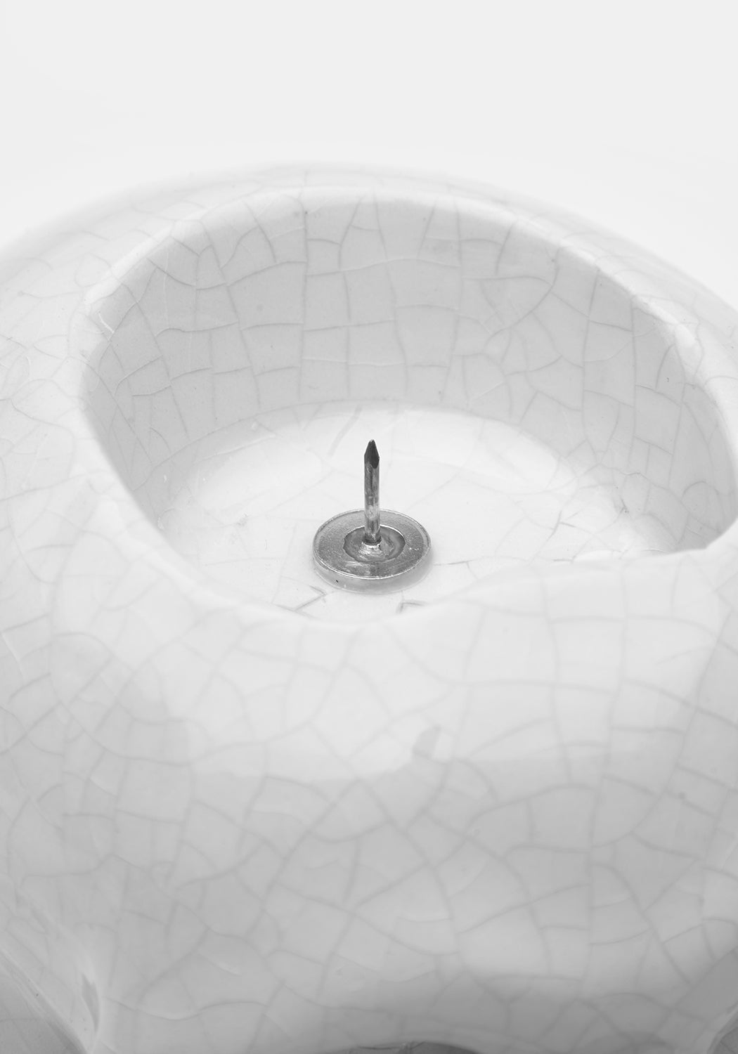 CRYING SKULL CANDLE HOLDER