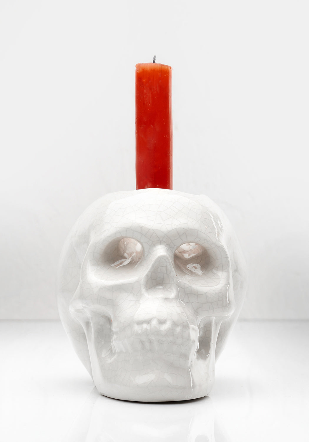 CRYING SKULL CANDLE HOLDER