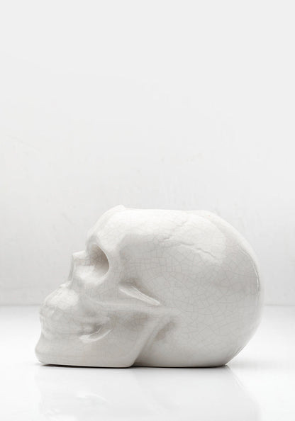 CRYING SKULL CANDLE HOLDER